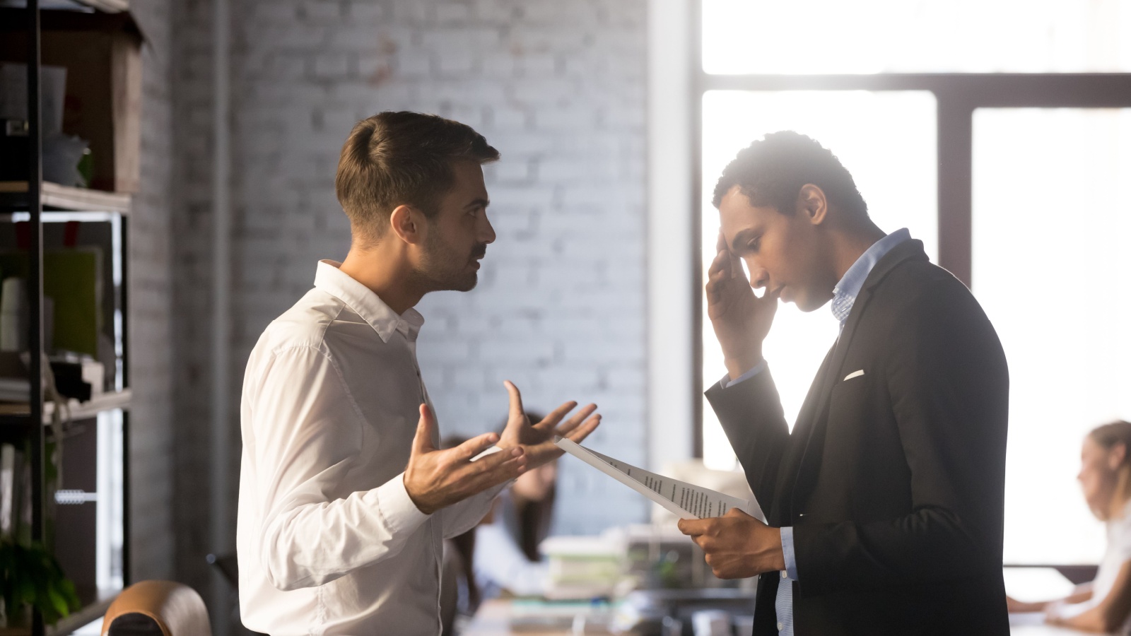 Upset guy talking to manager