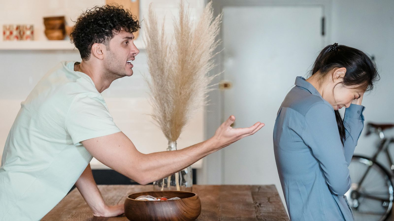 Toxic Relationship Explodes After Girlfriend Fights with Sick Partner for Not Answering Her Calls While He Was Literally Hospitalized Man and woman arguing at home