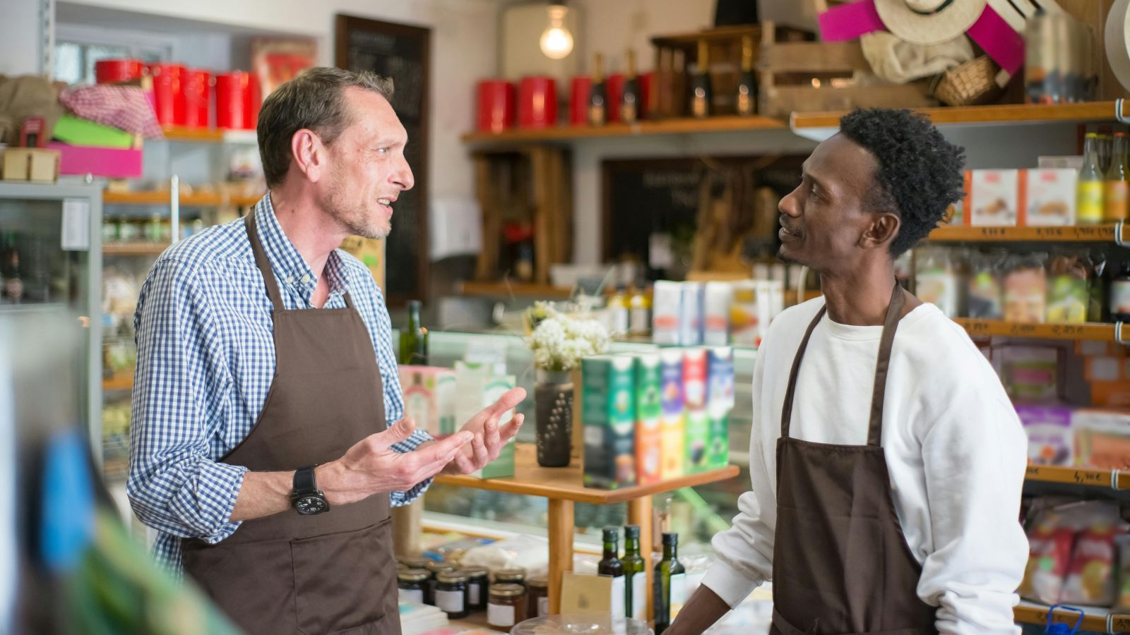 two men working at a grocery store