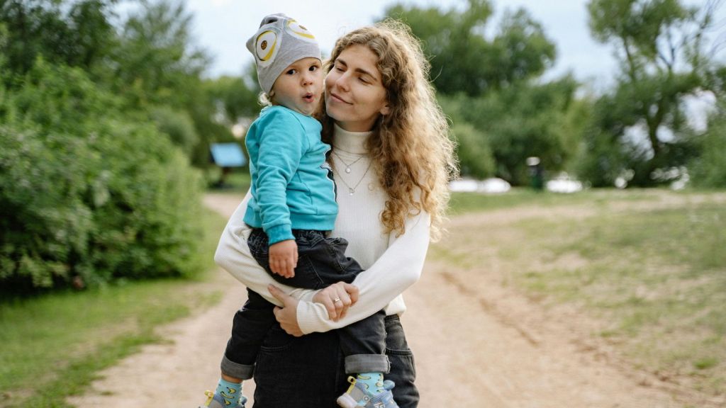 Woman holding a child