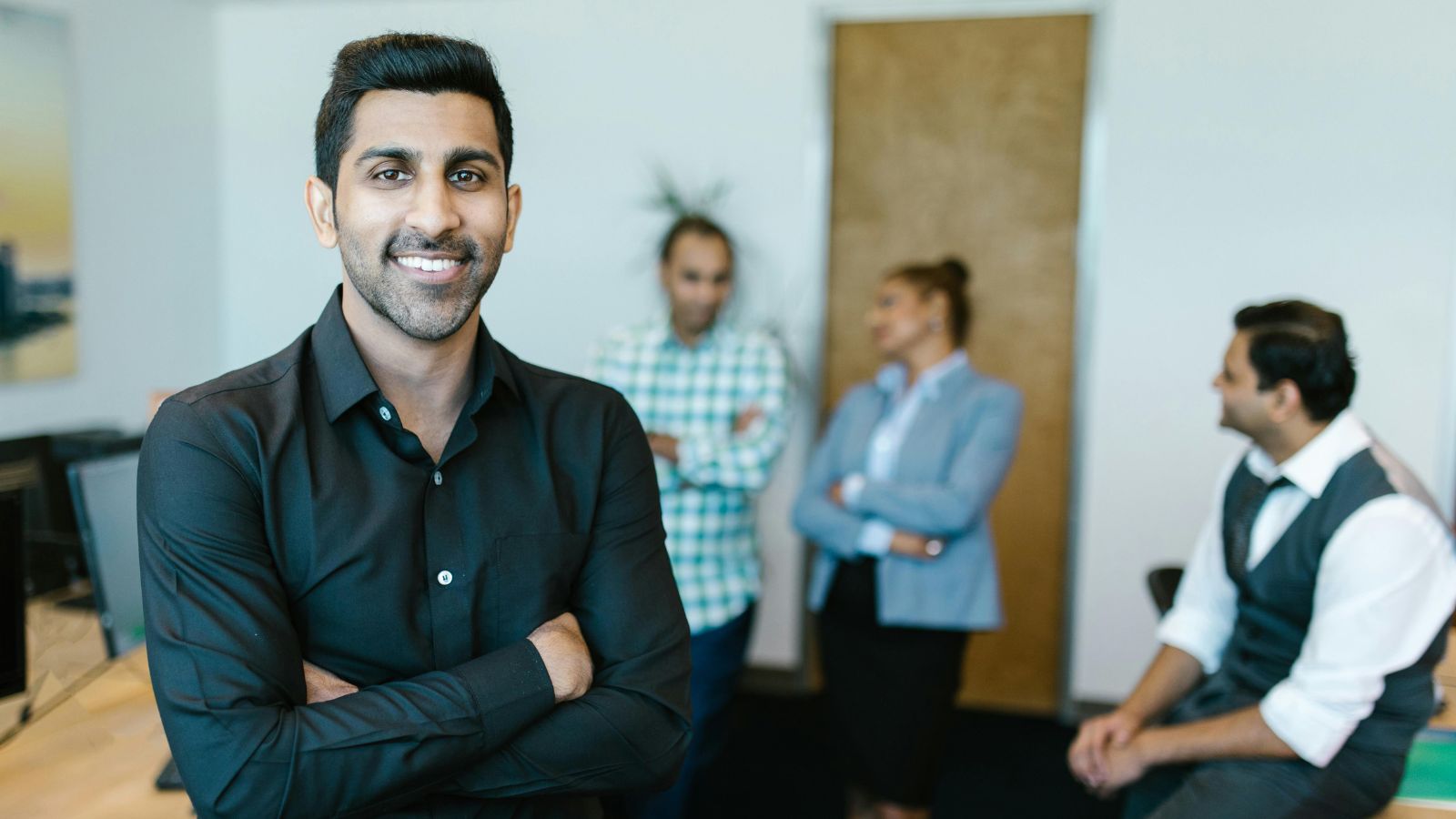 Employee Rejects Low Contract Offer and Refuses to Stay After Being Undervalued Man in black shirt in office