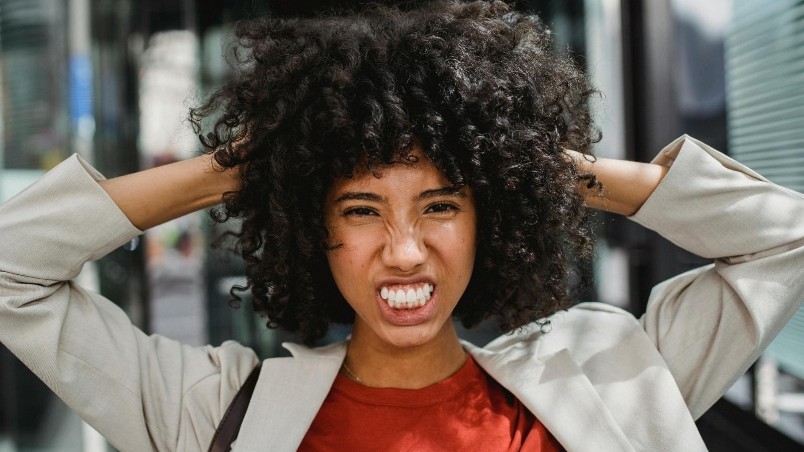 Worker Reaches Breaking Point After Two Consecutive Bosses Create Toxic Workplace angry professional woman gritting her teeth