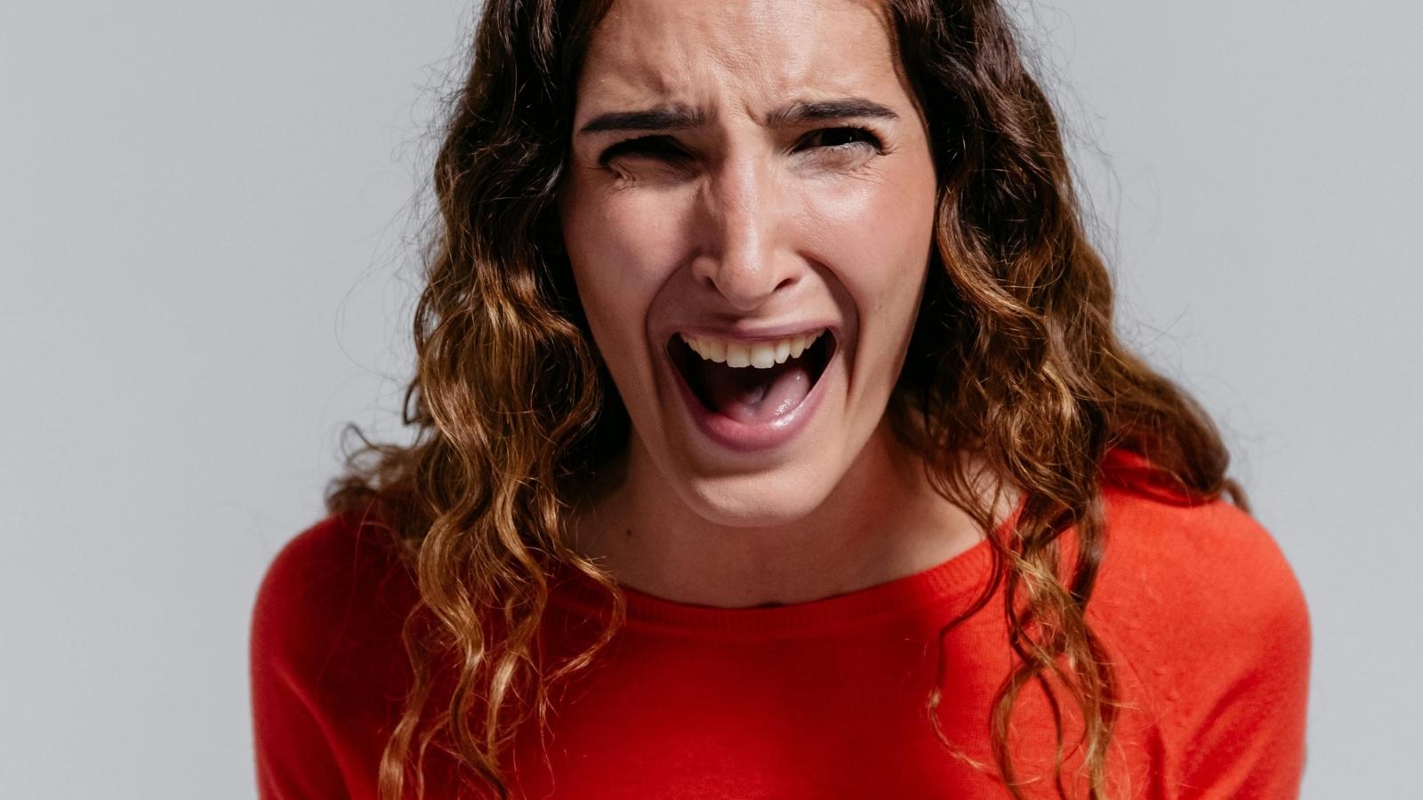 The Bank of Grandma Is Closed: Why I’m Choosing My Peace Over My Daughter’s Demands angry woman screaming in red shirt