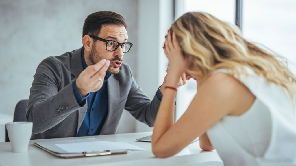 boss yelling at female employee