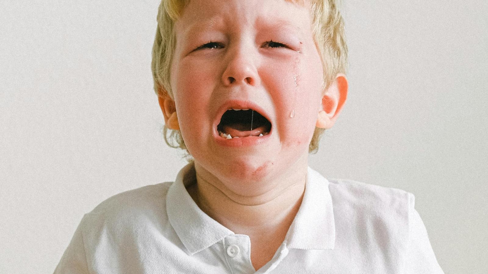 The Doormat Battle: Why One Pair of Neighbors Decided That Destruction Was the Only Way to Win blonde little kid crying