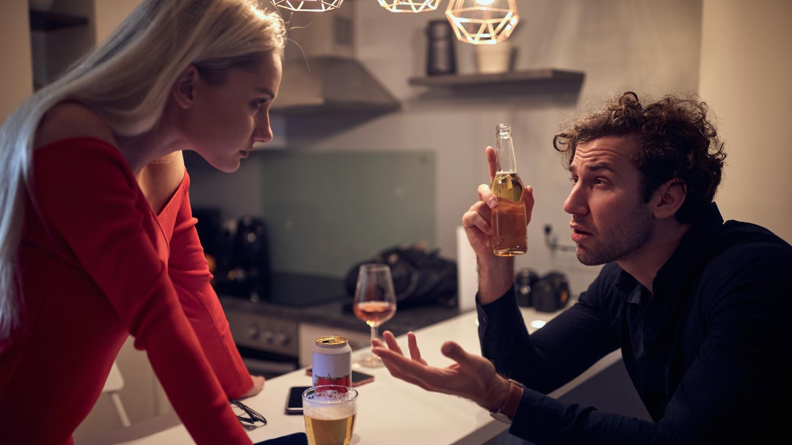 man and woman talking