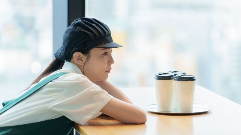 contemplative restaurant server