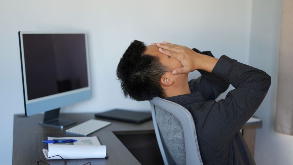 man upset at work