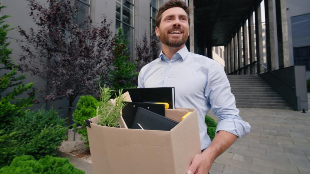 man walking out of an office