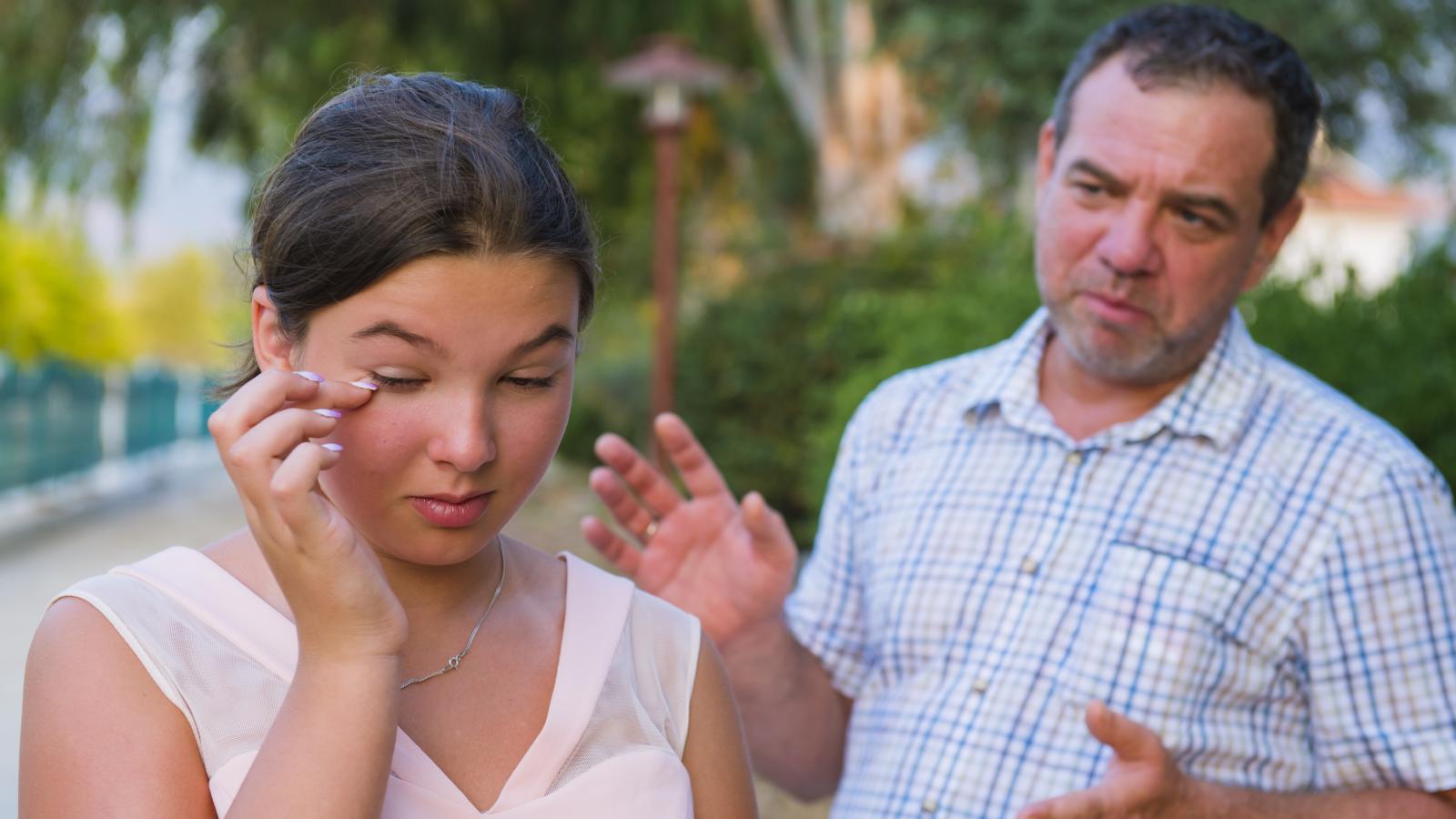 man and woman talking
