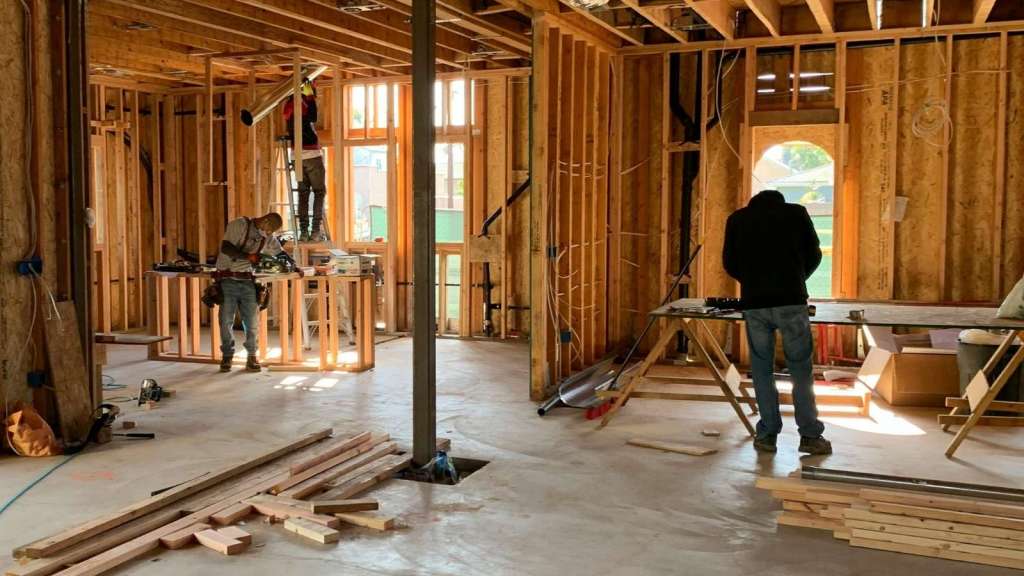 construction workers working in house
