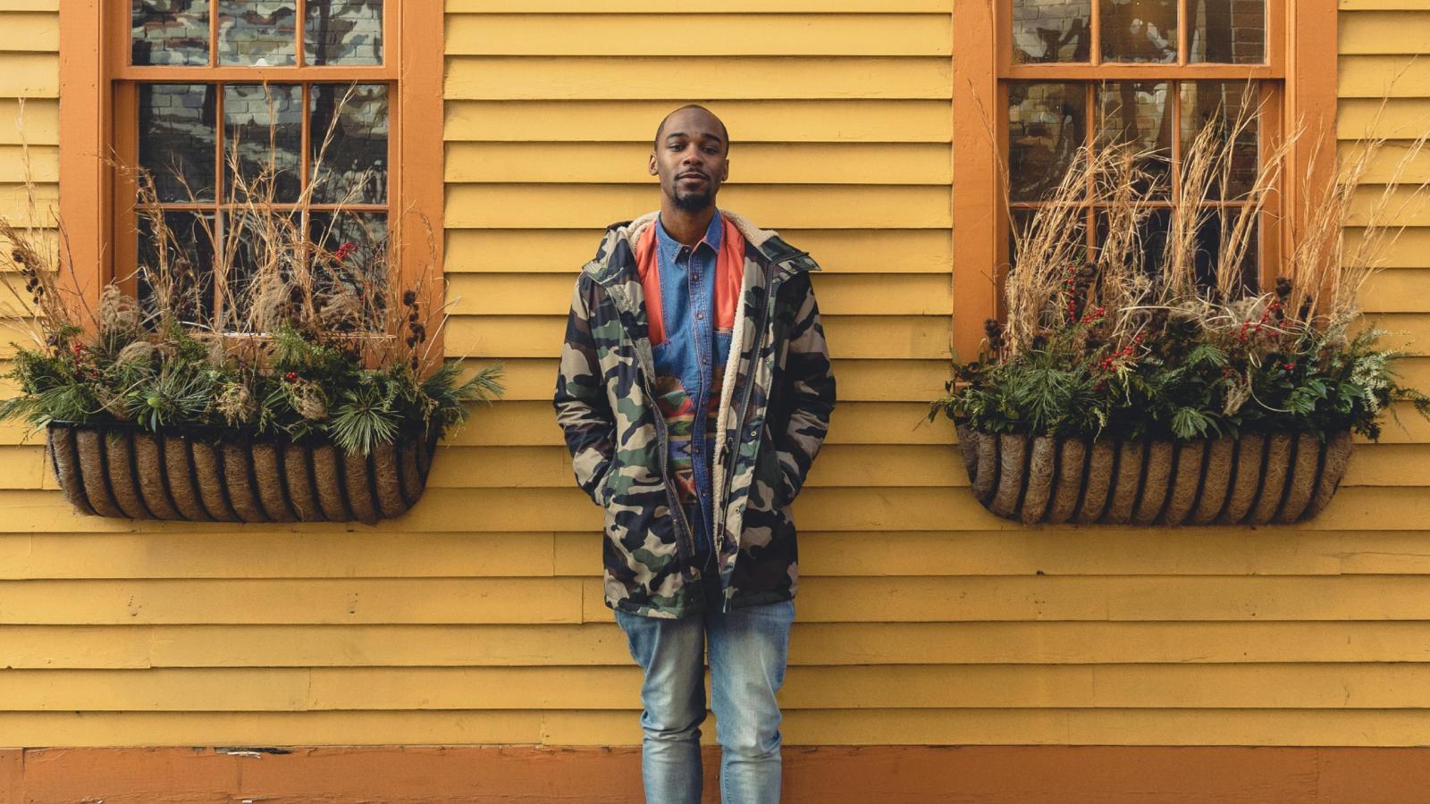 Man Refuses to Let Brothers Live in His House While He’s Abroad Over Responsibility Concerns man in front of a house