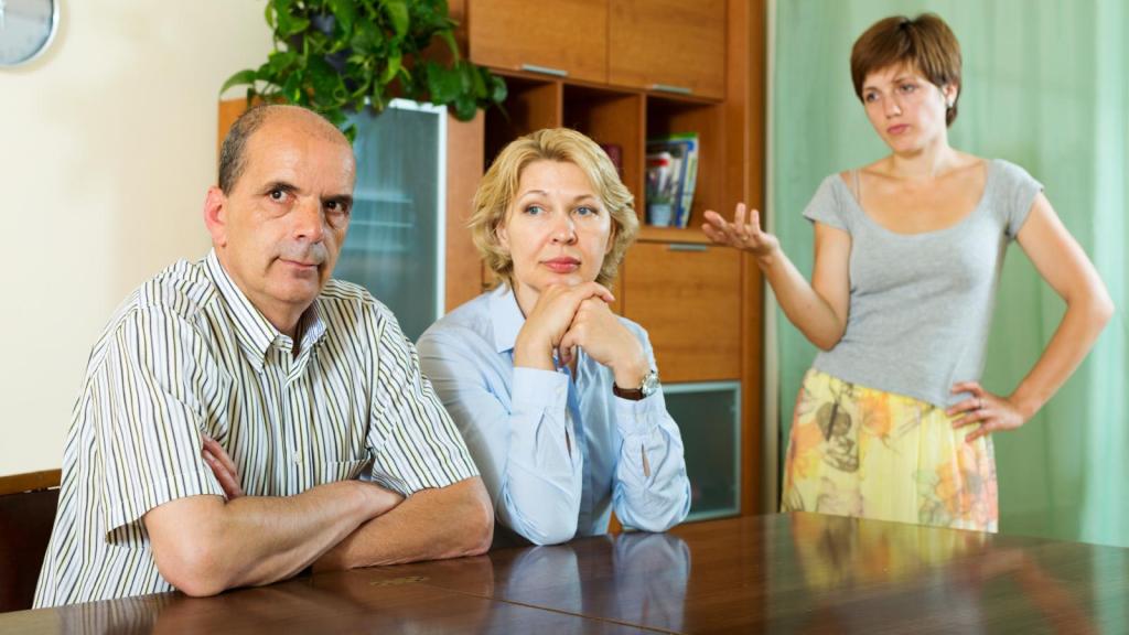 woman talking to her parents