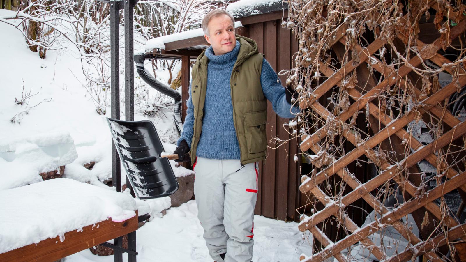 man with a snow shovel