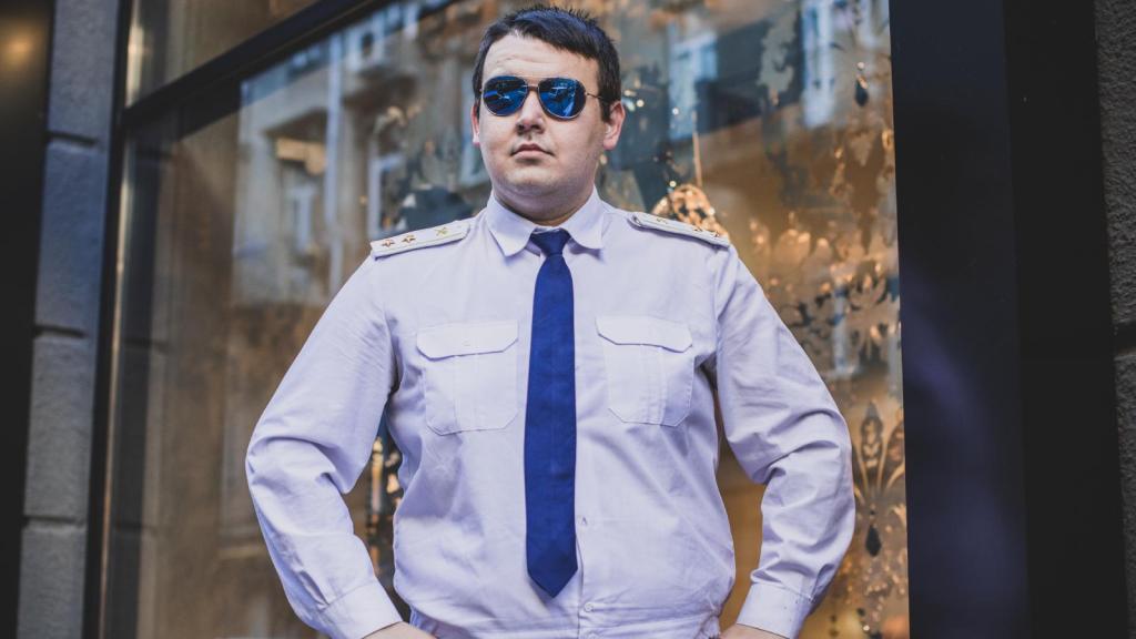 man in a blue uniform