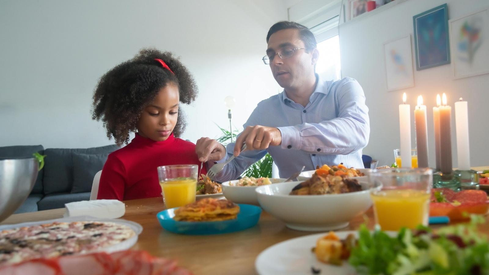 family sitting at the dinner table