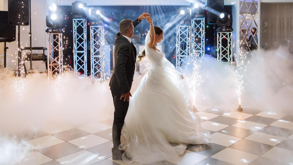 bride and groom dancing