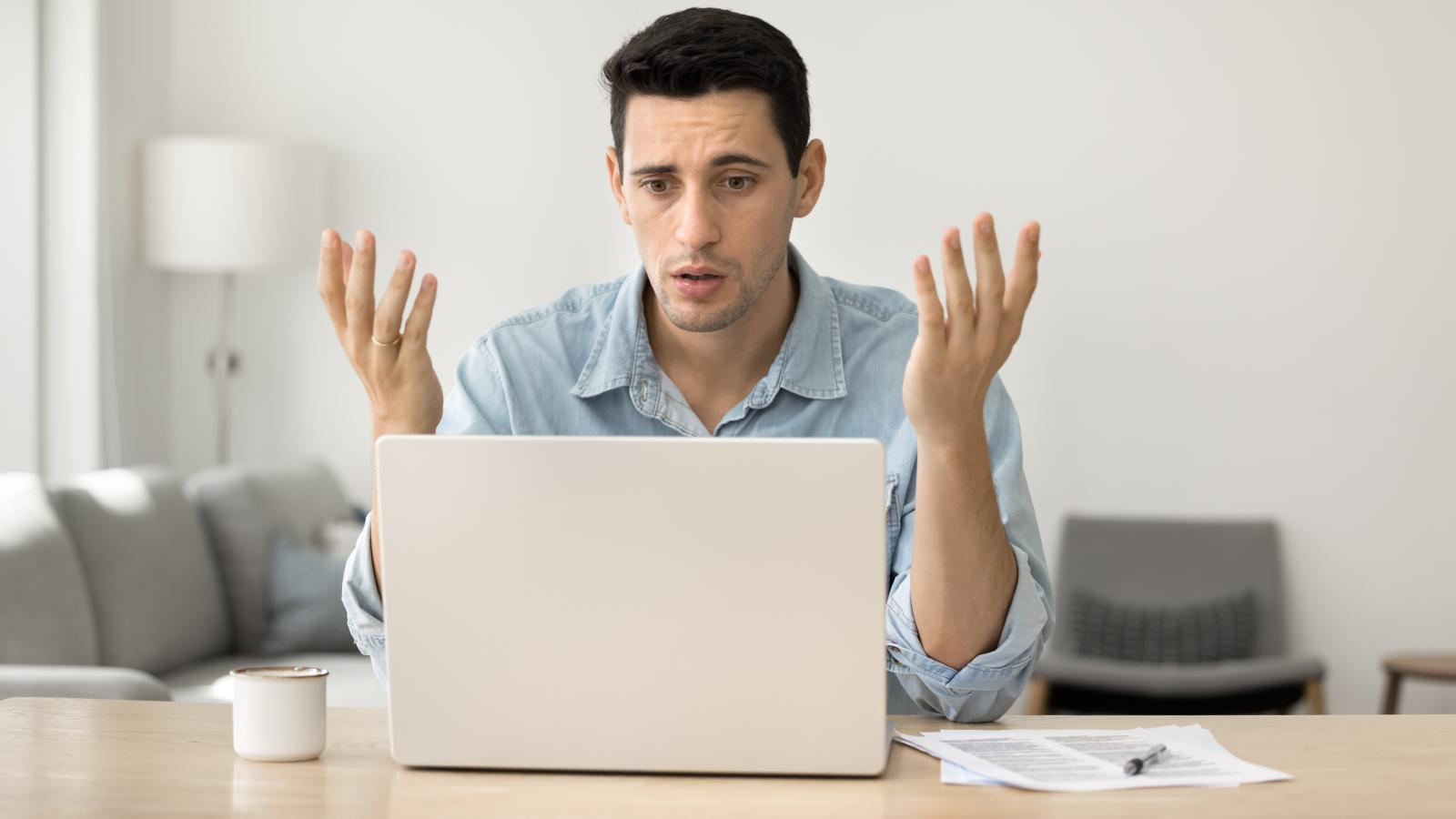A Worker Called Out a Completely Useless Meeting, and Plenty of Employees Can Relate man at a desk