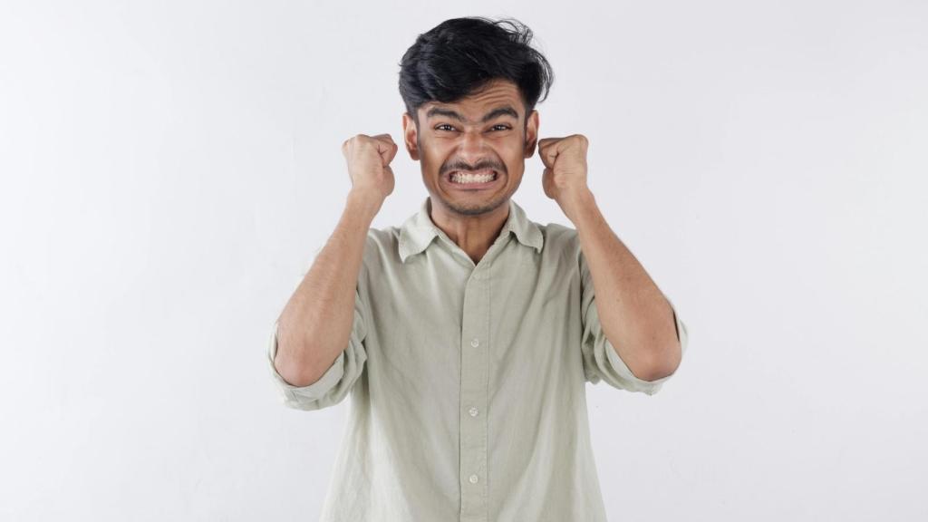 frustrated man clenching his fists