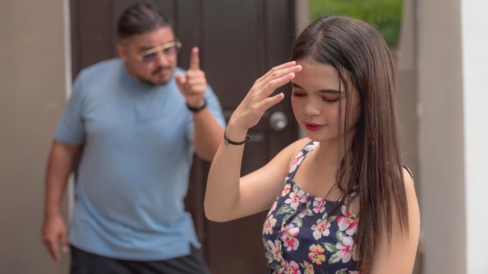 man yelling at his daughter