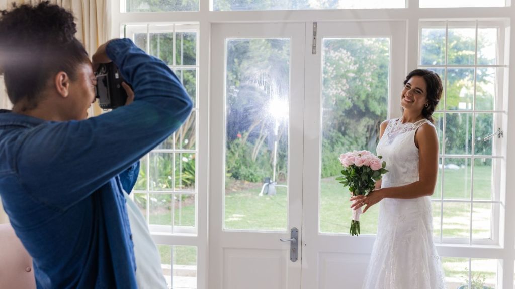 photographer taking bride's photo