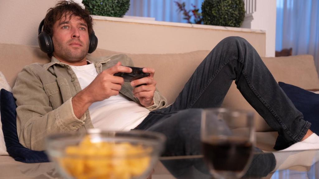 man playing video games