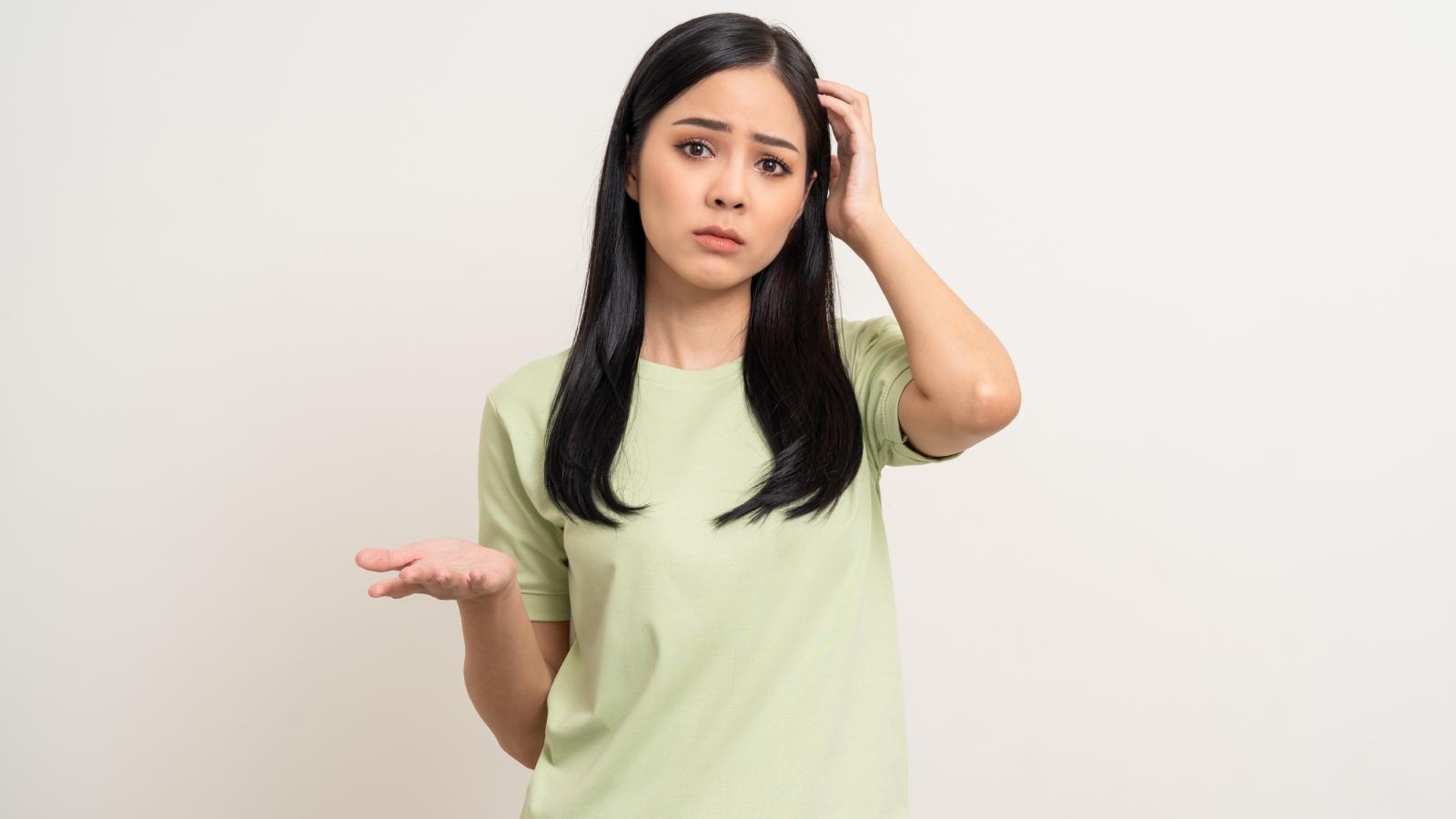 woman with a confused expression
