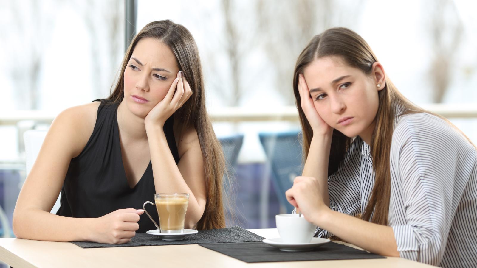 Bride Faces Family Backlash After Choosing Sister’s Childhood Bully as Maid of Honor two women ignoring each other