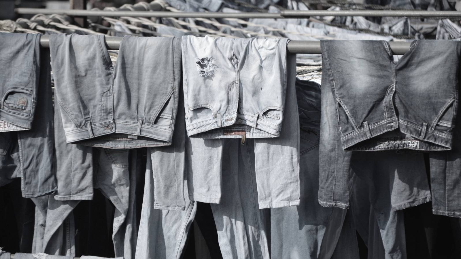 jeans hanging out to dry