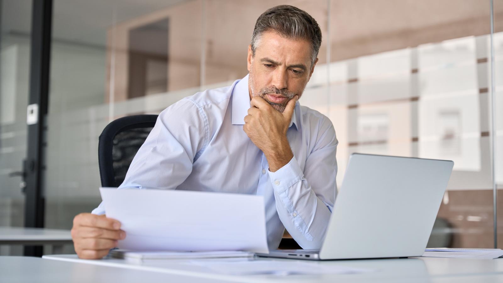 man reading a letter