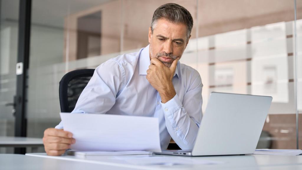 man reading a letter