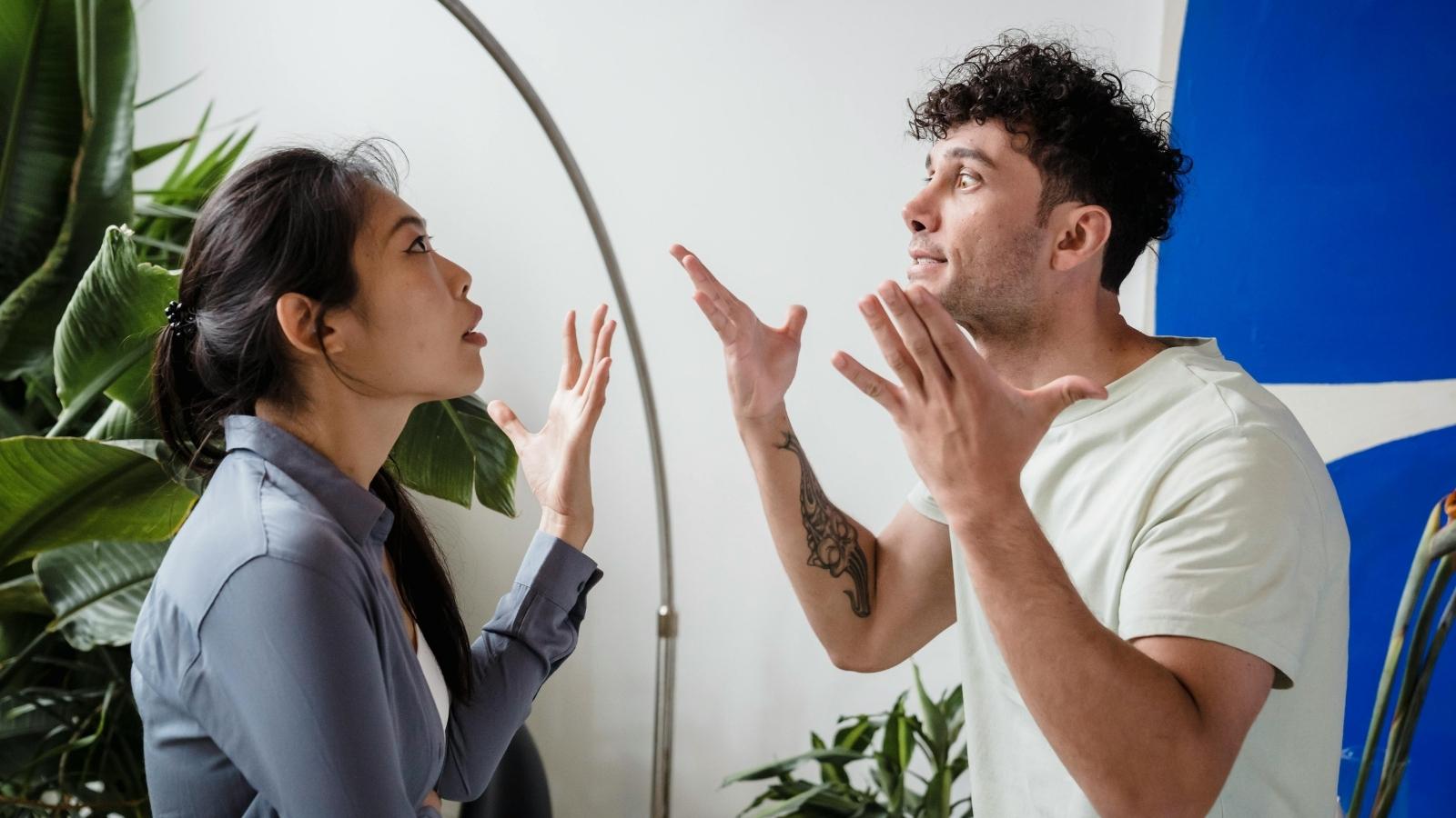 man and woman having a spirited argument