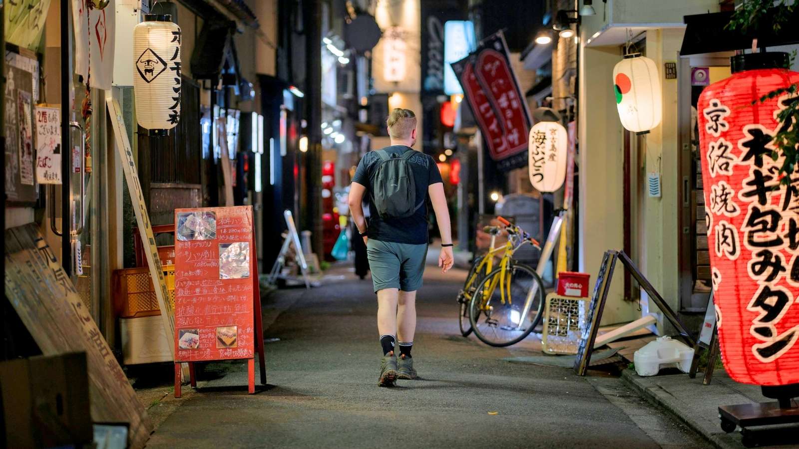 A Dream Trip to Japan Took an Unexpected Turn After One Husband Spent It Running Family Errands man sightseeing in Japan