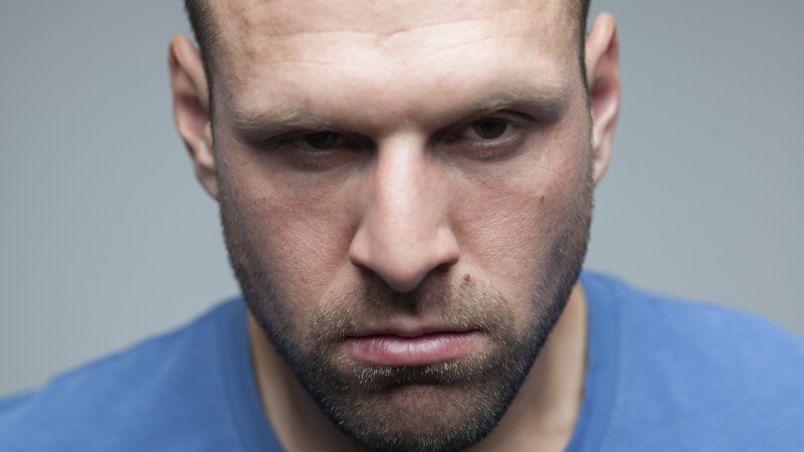 A man giving the camera an intimidating look