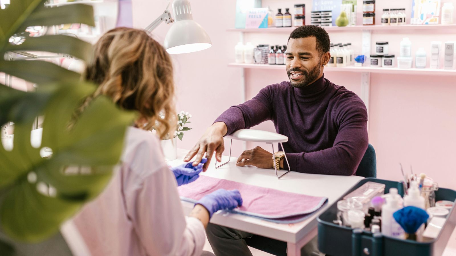 Financially Strapped Couple Cuts Back on Manicures, but Boyfriend Feels Resentful Over Spending Man in a nail salon getting his nails done