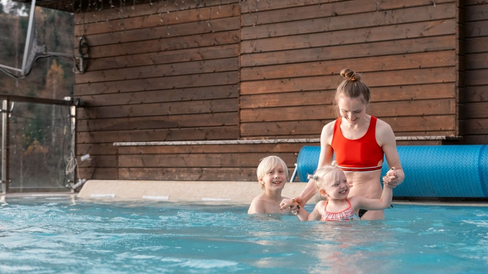 Working Vacation Nightmare: Nanny Accused of Betrayal After Defending Her Agreed Upon Day Off nanny with kids in the pool