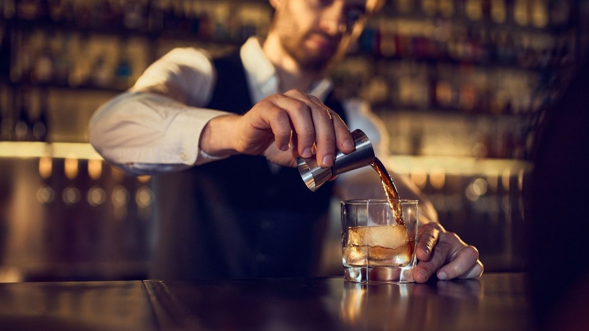 bartending pouring a drink