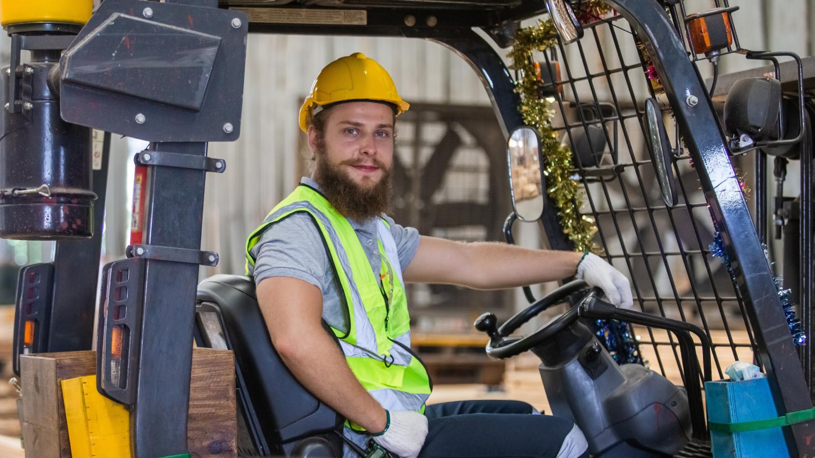 man driving a forklift