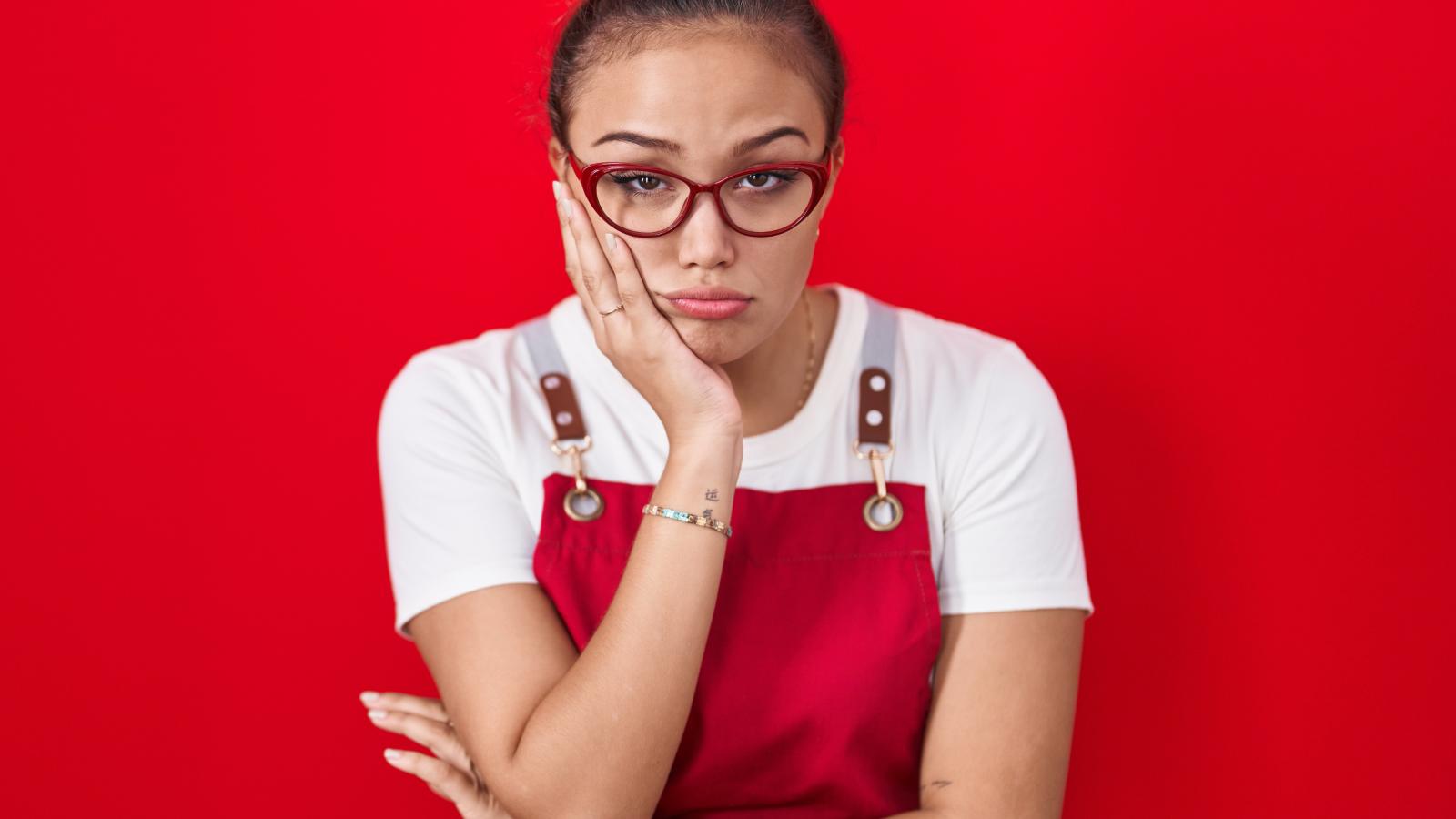 woman with a tired expression