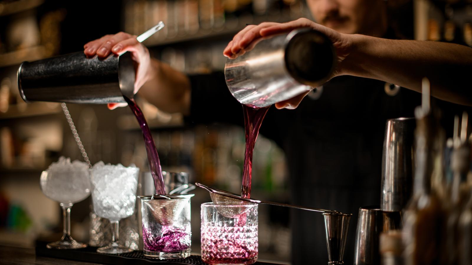 A Bartender’s Ongoing Frustration With One Coworker Is Reaching a Breaking Point man making a drink