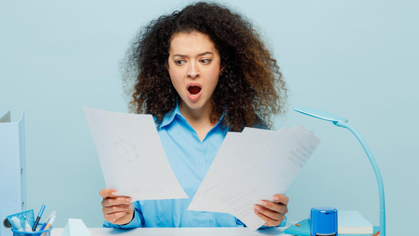 woman reading some papers