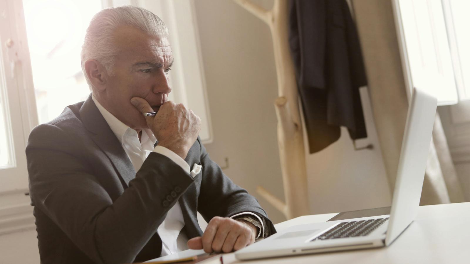 Recruiter Feels Heartbroken After Older Job Candidate Struggles With Basic Technology man on a computer