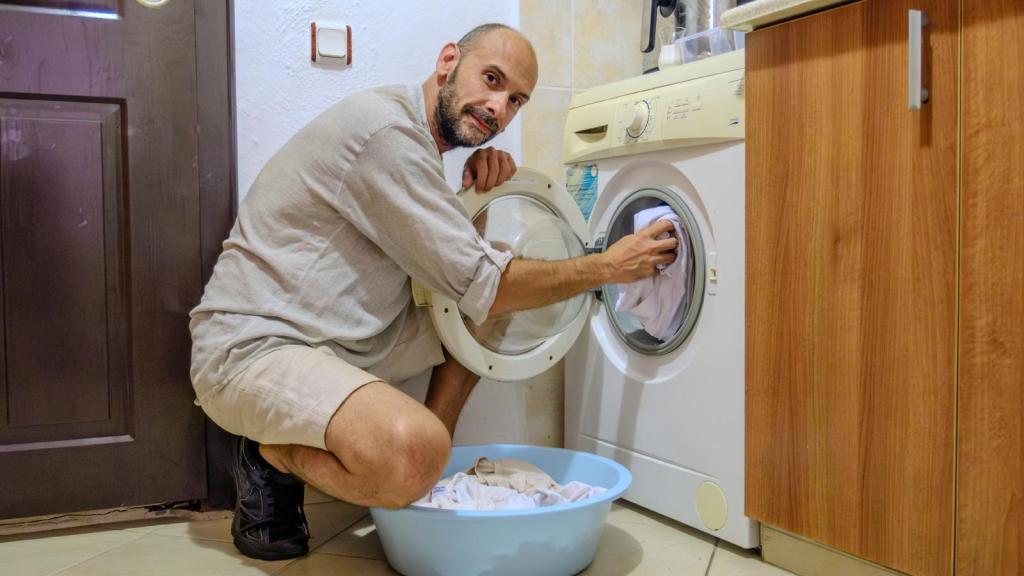 man doing some laundry