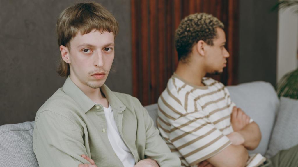two men ignoring each other