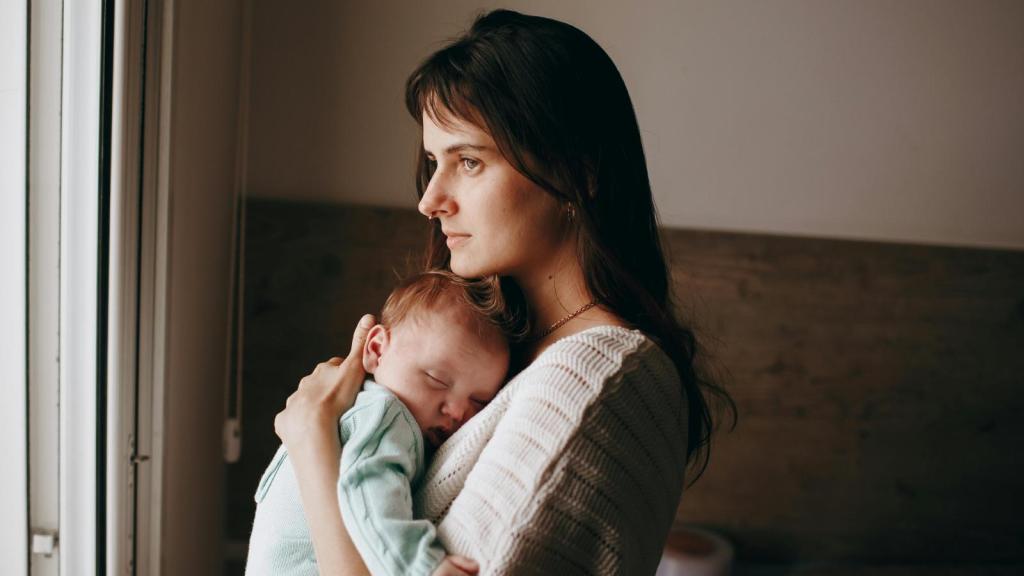 woman holding a baby