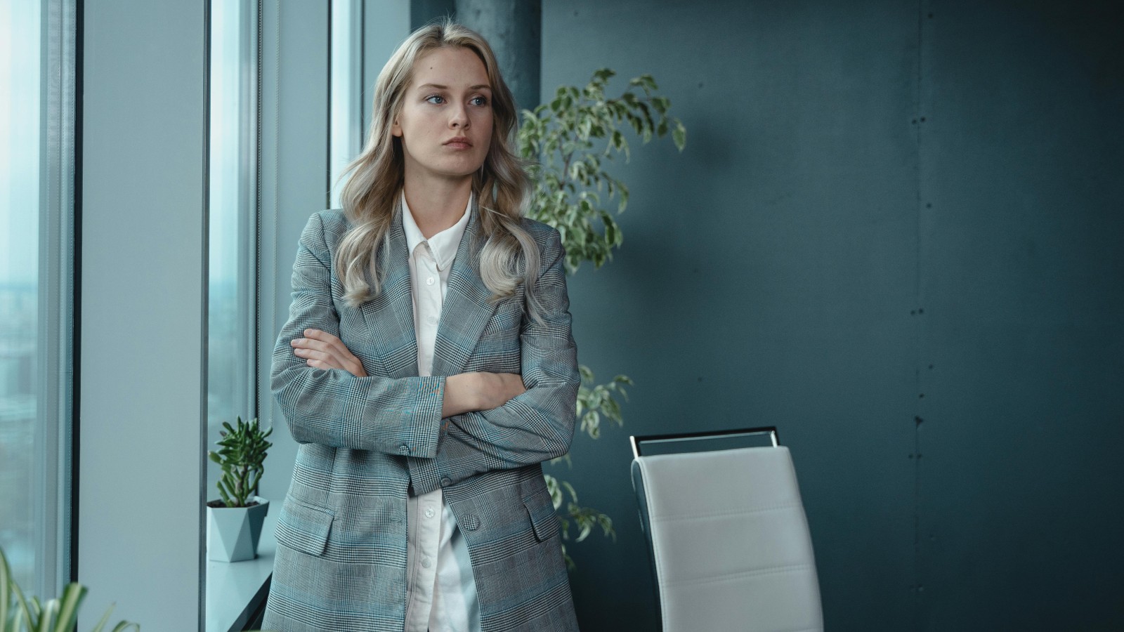 businesswoman with her arms crossed