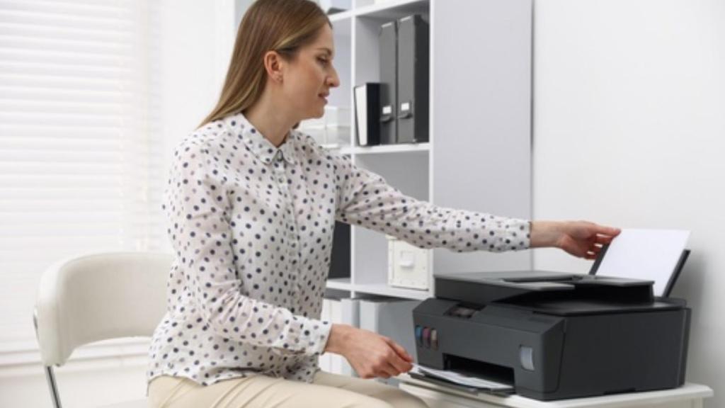 Teacher printing papers