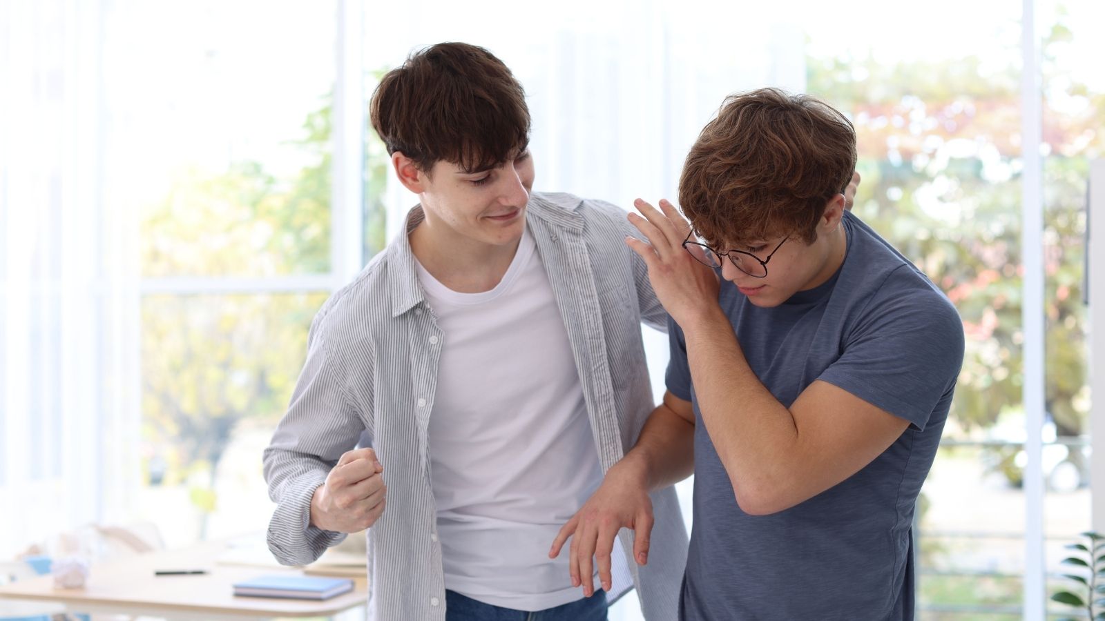 school bully harassing kid