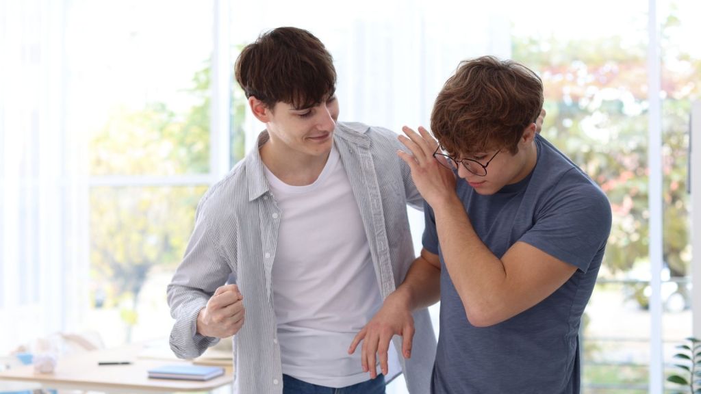 school bully harassing kid