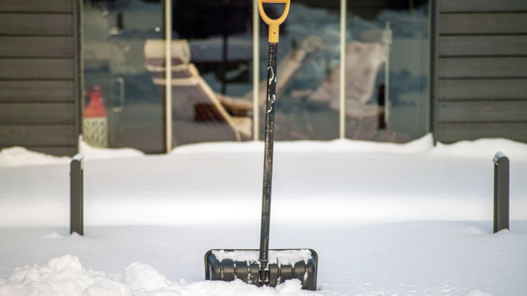 snow shovel stuck in driveway